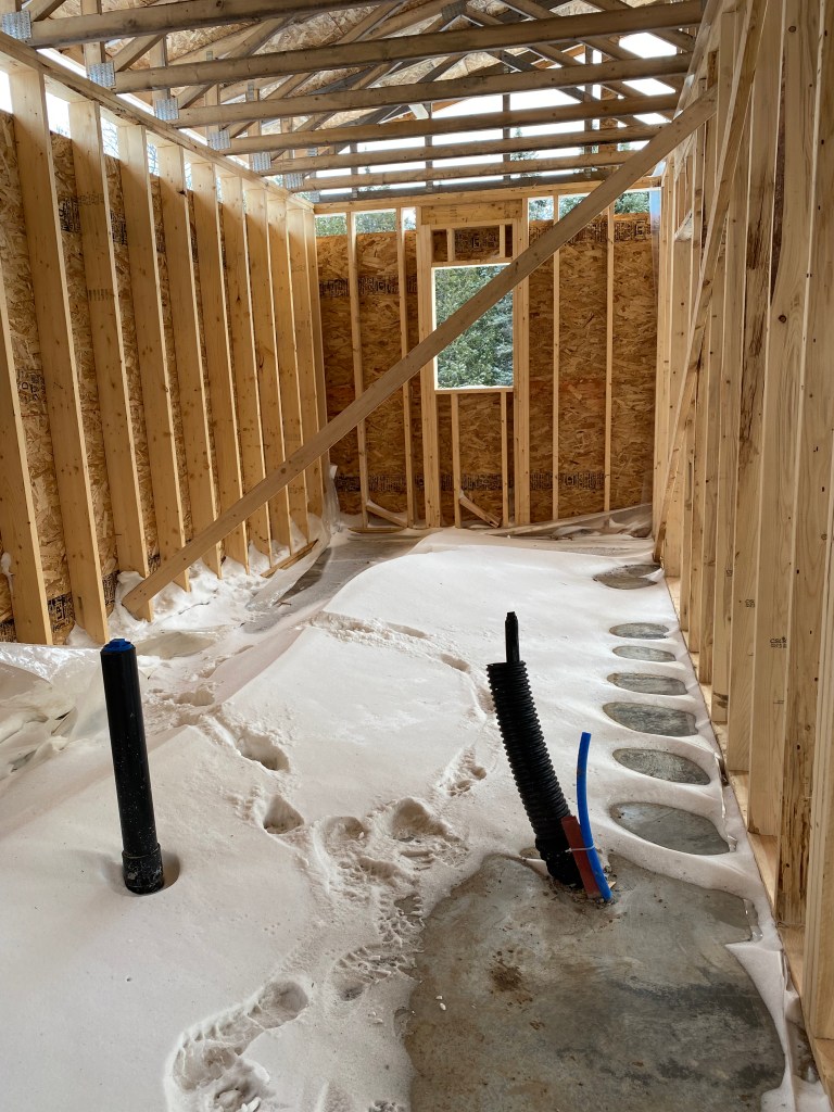 Photo of snow drift inside house under construction